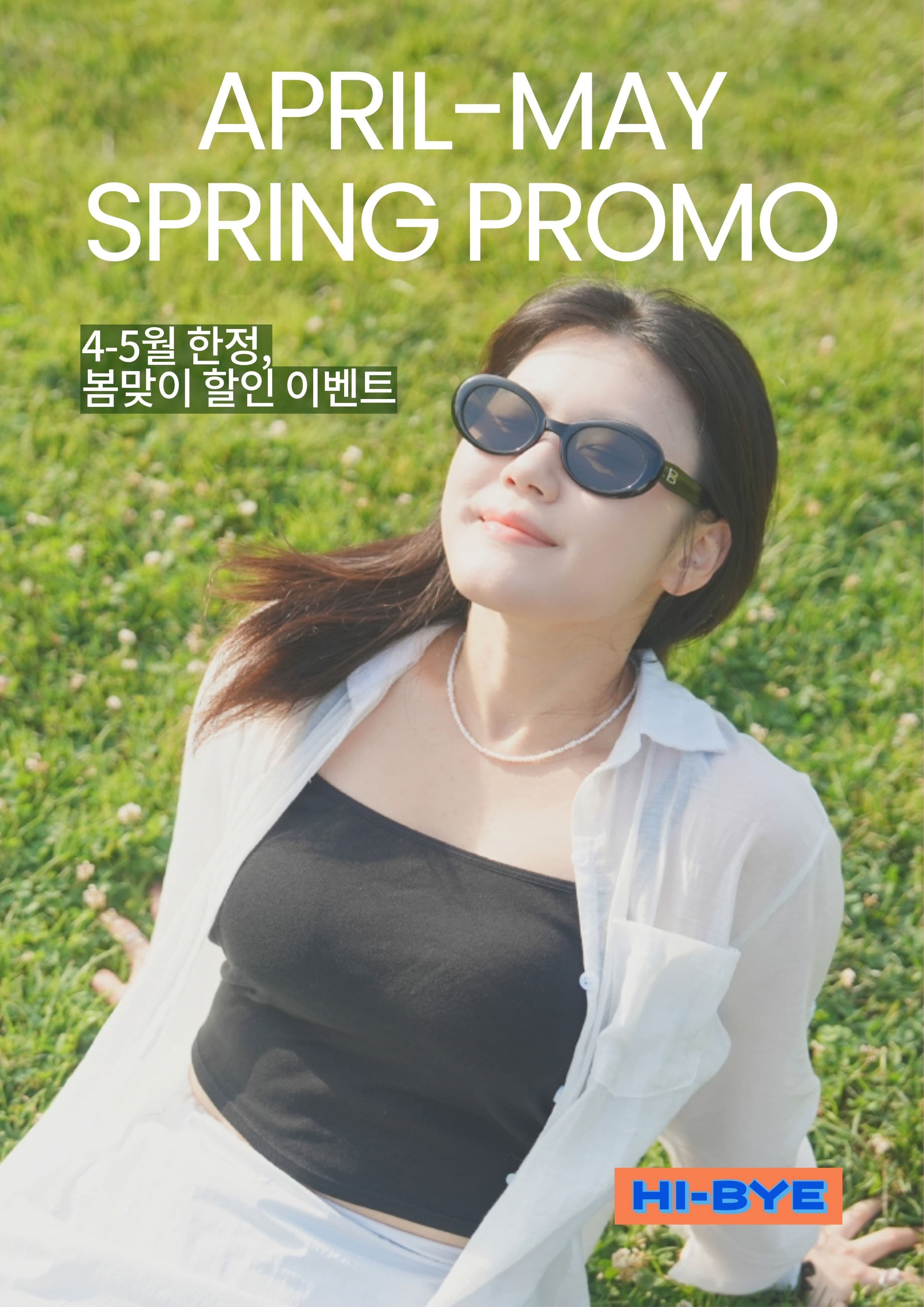 women sitting on the grass